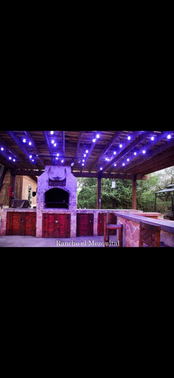 Outdoor kitchen and bar with lights Rancho El Mezquital McAllen